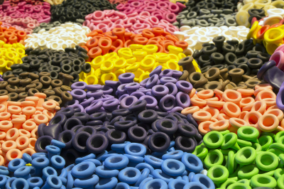 Closeup of a colorful pattern of latex balloon nozzles