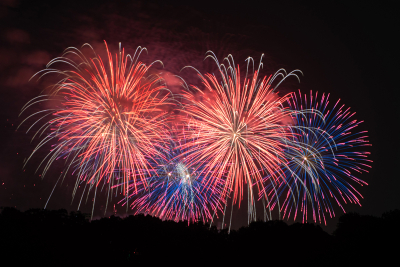 Fourth of July fireworks lighting up the night sky over Lake Grapevine on Independence Day