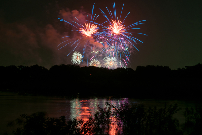 Fourth of July fireworks lighting up the night sky over Lake Grapevine on Independence Day